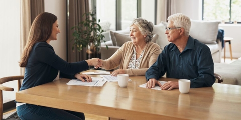 Financial advisor meeting with couple who is working on their estate plan
